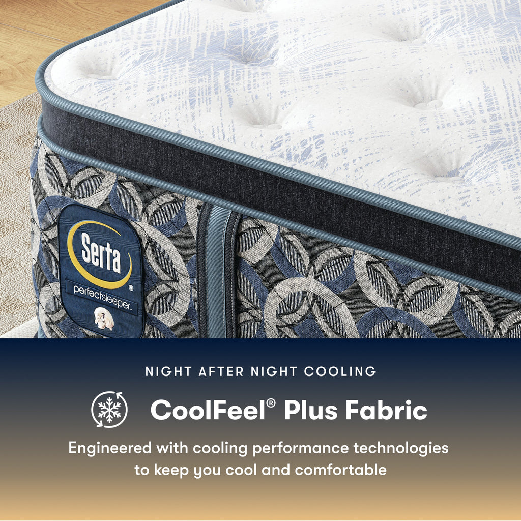 Serta perfect sleeper plush mattress with CoolFeel Plus Fabric feature on a wooden floor.