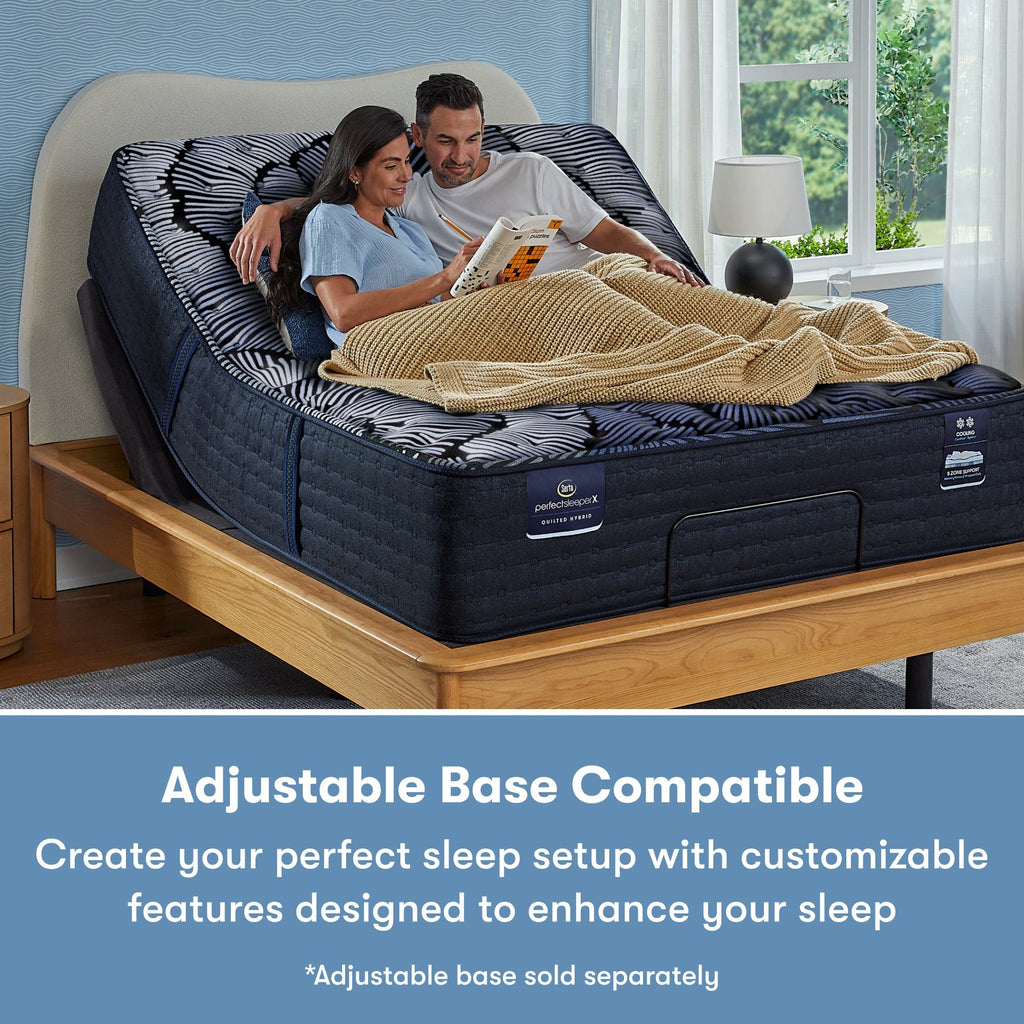 Man and woman sitting in a Perfect Sleeper X Quilted Hybrid Max Plush Pillow Top Mattress sitting in an adjustable base frame || feel: Plush Pillow Top || level: Level 2