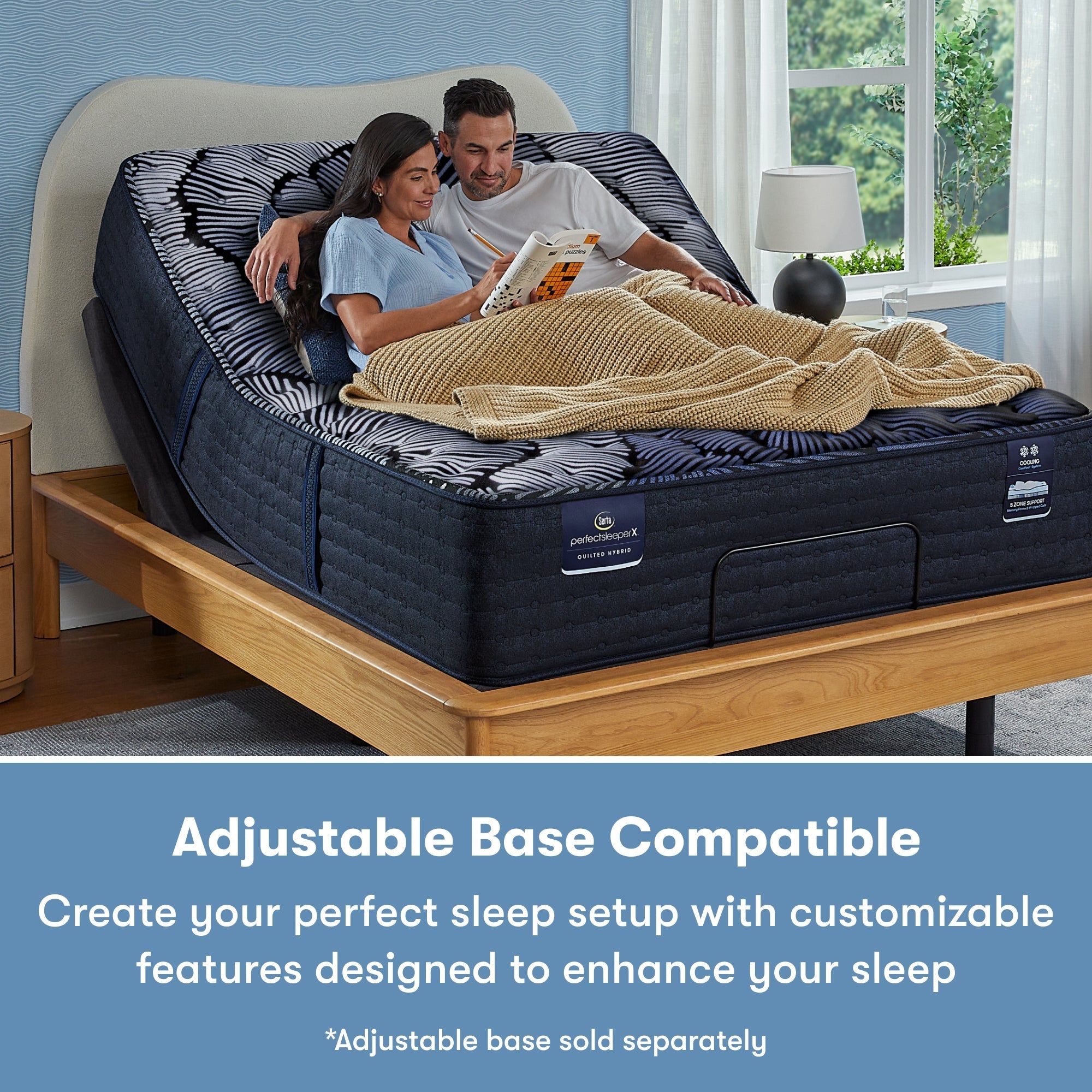 Man and woman sitting in a Perfect Sleeper X Quilted Hybrid Max Plush Pillow Top Mattress sitting in an adjustable base frame || feel: Plush Pillow Top || level: Level 2