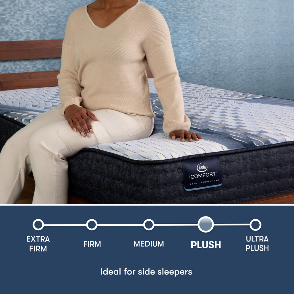 Woman sitting on the side of an iComfort Iona Plush Mattress || feel: plush || level: Standard - 13"