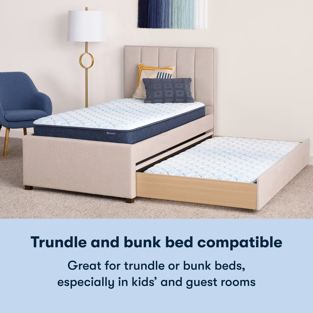 6 inch foam mattress sitting in a beige trundle bedframe || feel: Foam (6" Profile)