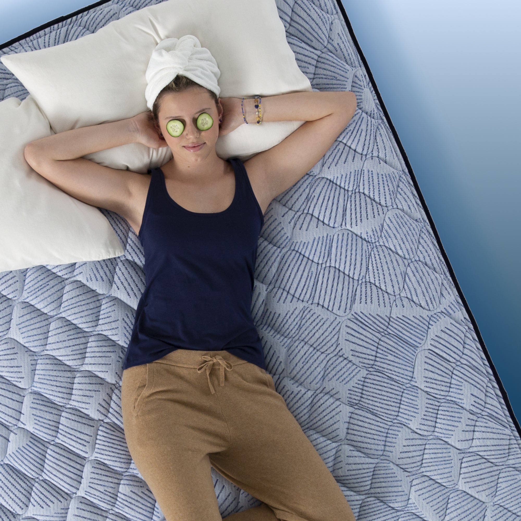 Serta Perfect Sleeper mattress with girl lounging||feel: plush||level: enhanced
